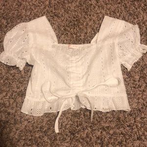 White puff-sleeve ruched front top